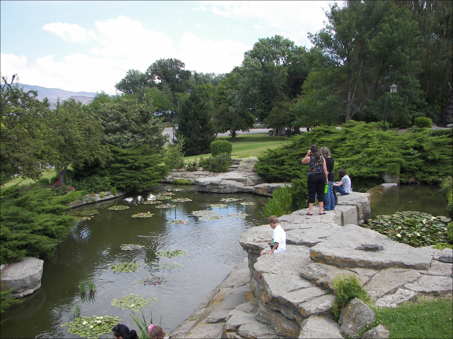 Pond on grounds of Boise Train Depot (L-R) Katherine with Barbara, Anna, and Catherine Bruton